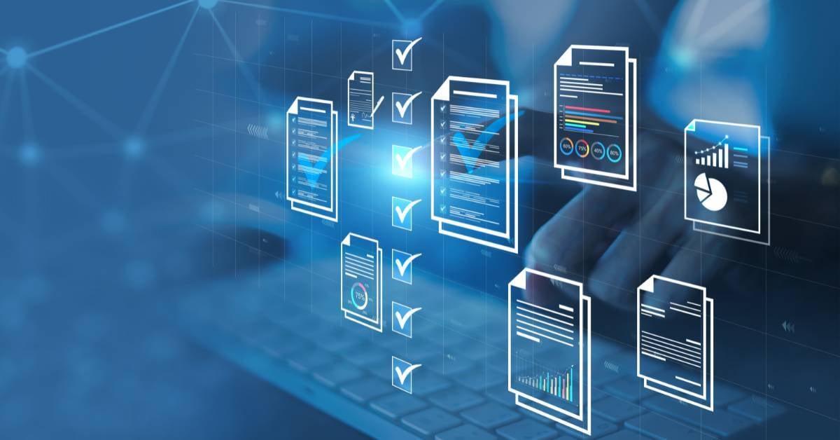 Data icons appearing over a computer. 