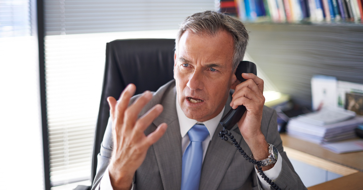 Man yelling on the phone
