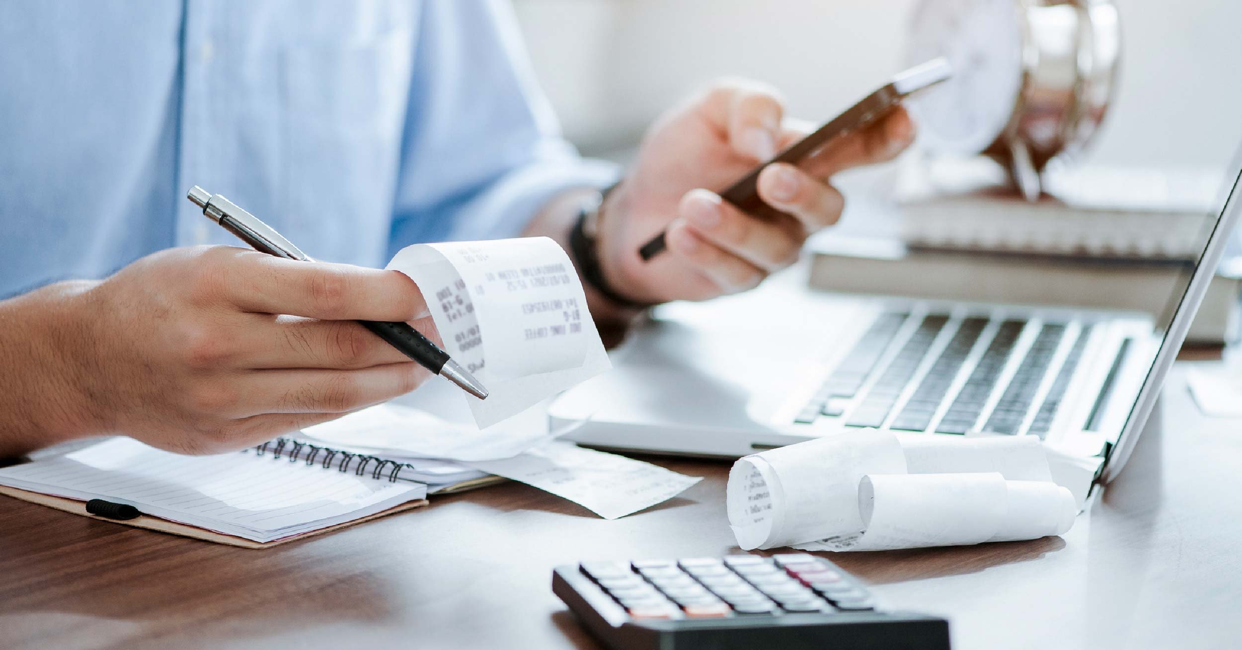 Person calculating costs