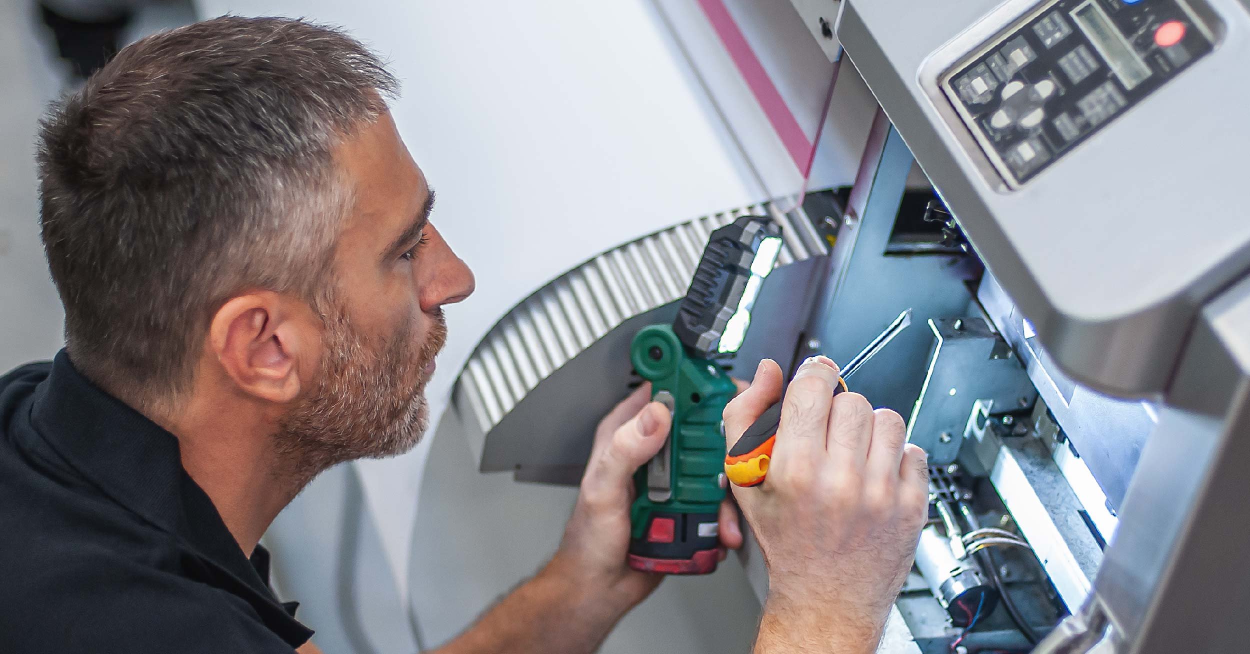 Person fixing a printer