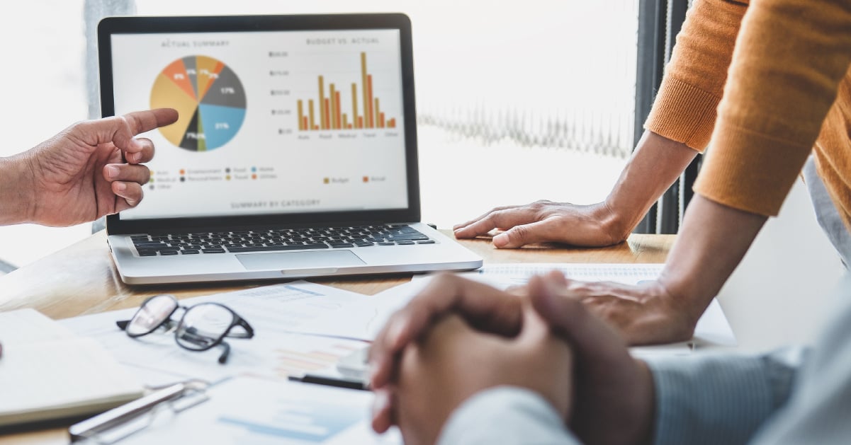 A business team views real-time analytics to see where changes to their print environment could help them reduce unnecessary waste and costs.