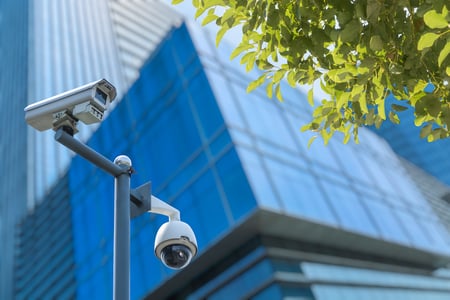 Digital video surveillance cameras outside a professional building