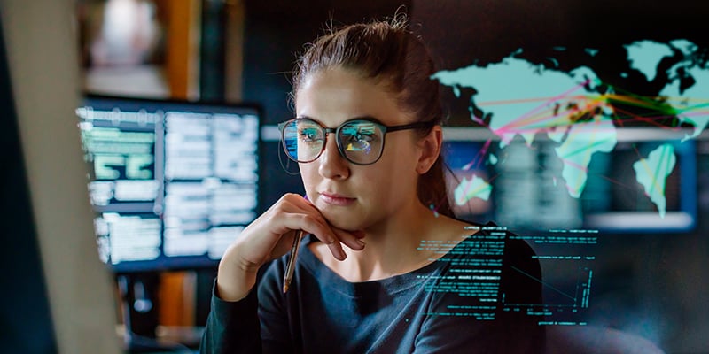 Screen reflecting off of person's glasses
