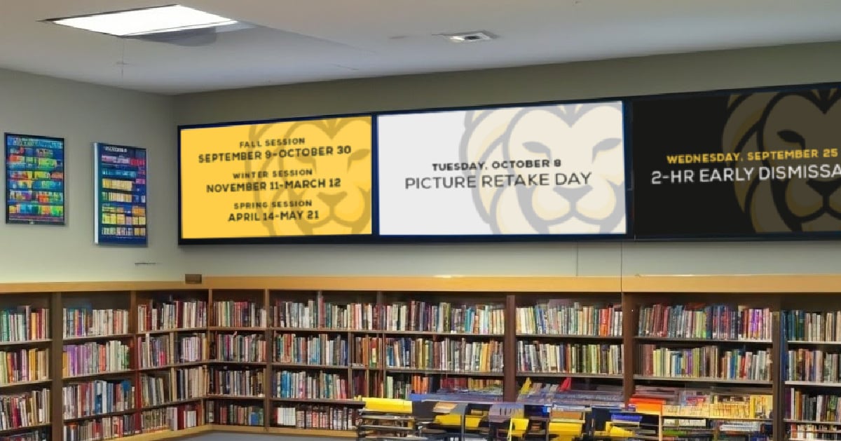 Digital signage at a school library with important school annnouncements and scheduling information.
