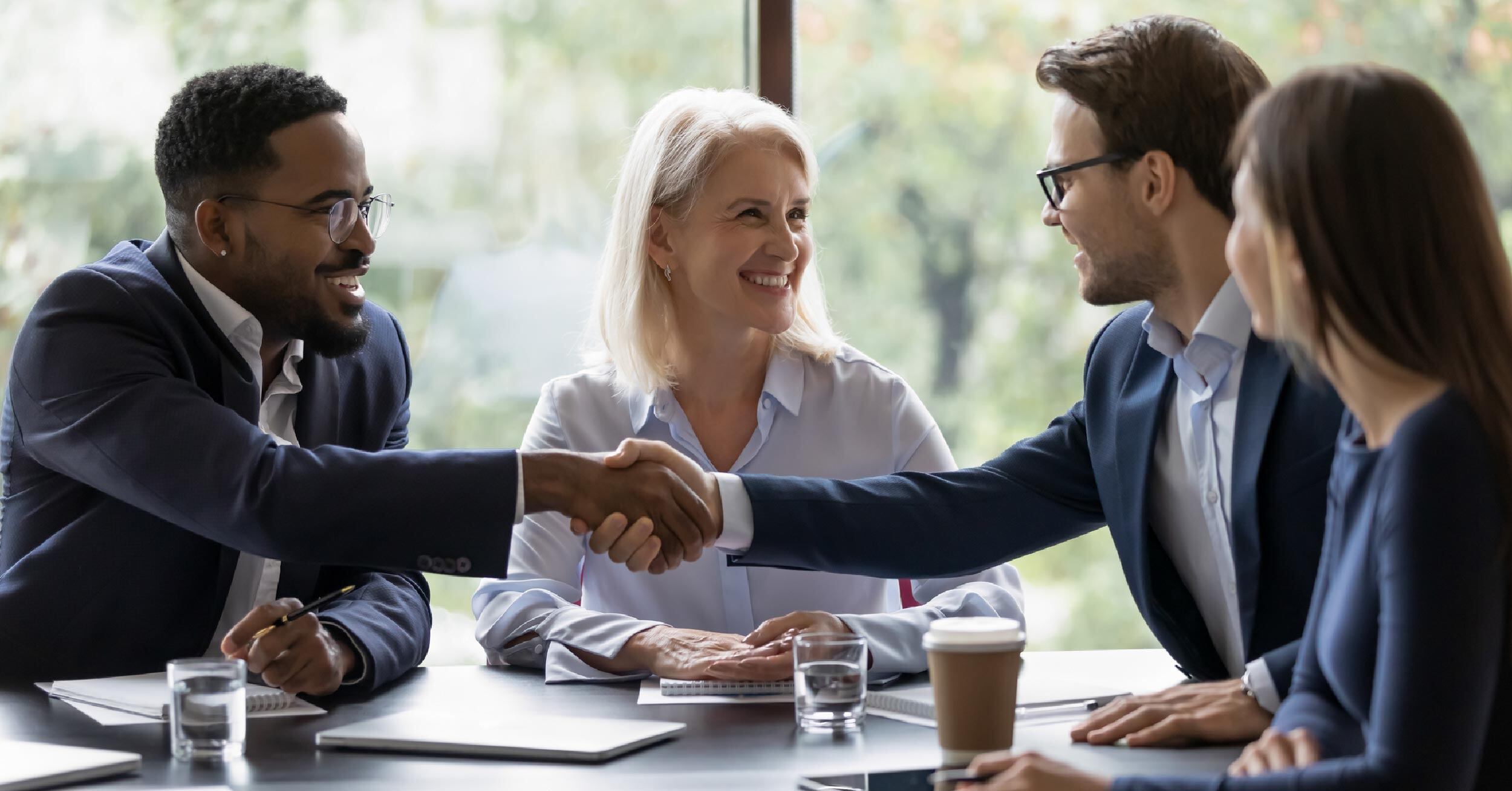 Business executives meet with a managed print provider to discuss how they might increase productivity and security while reducing unnecessary print costs. 